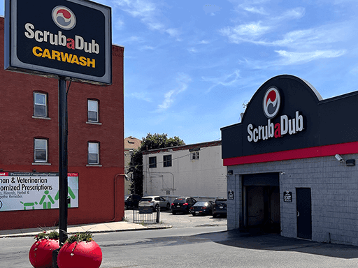 ScrubaDub Shrewsbury Street car wash with a ScrubaDub Carwash pylon sign in Worcester