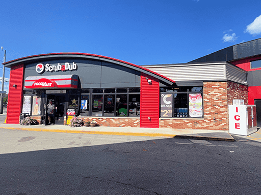 ScrubaDub Portland FoodMart convenience store with its curved roof and red trim