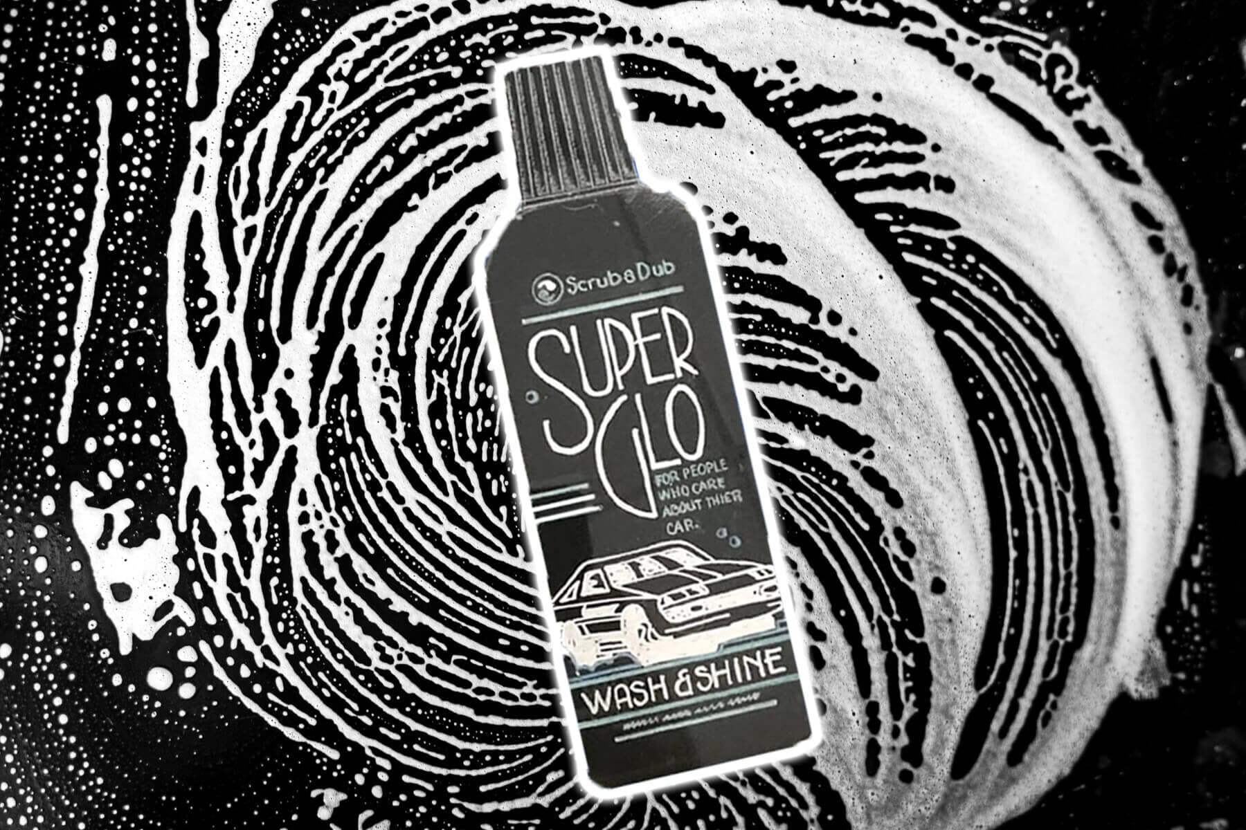 Vintage ScrubaDub SuperGlo Wash & Shine soap bottle over a swirl of white suds
