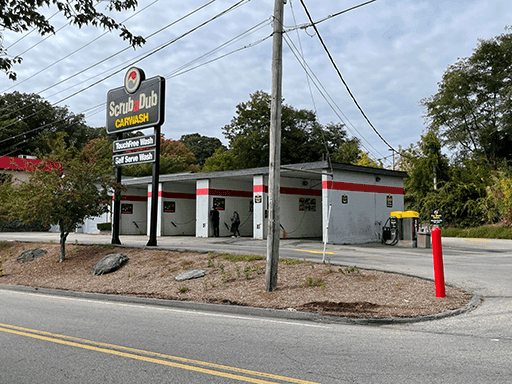 ScrubaDub Jennings Street self-serve car wash with TouchFree and Self Serve signs